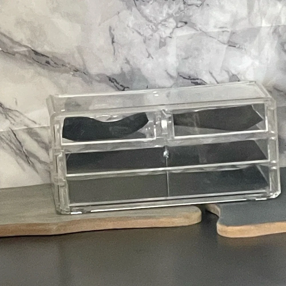 Elegant Clear Makeup Organizer with Black Accents